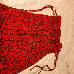 Red spaghetti strapped dress with black flowers